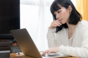  Woman using a personal computer